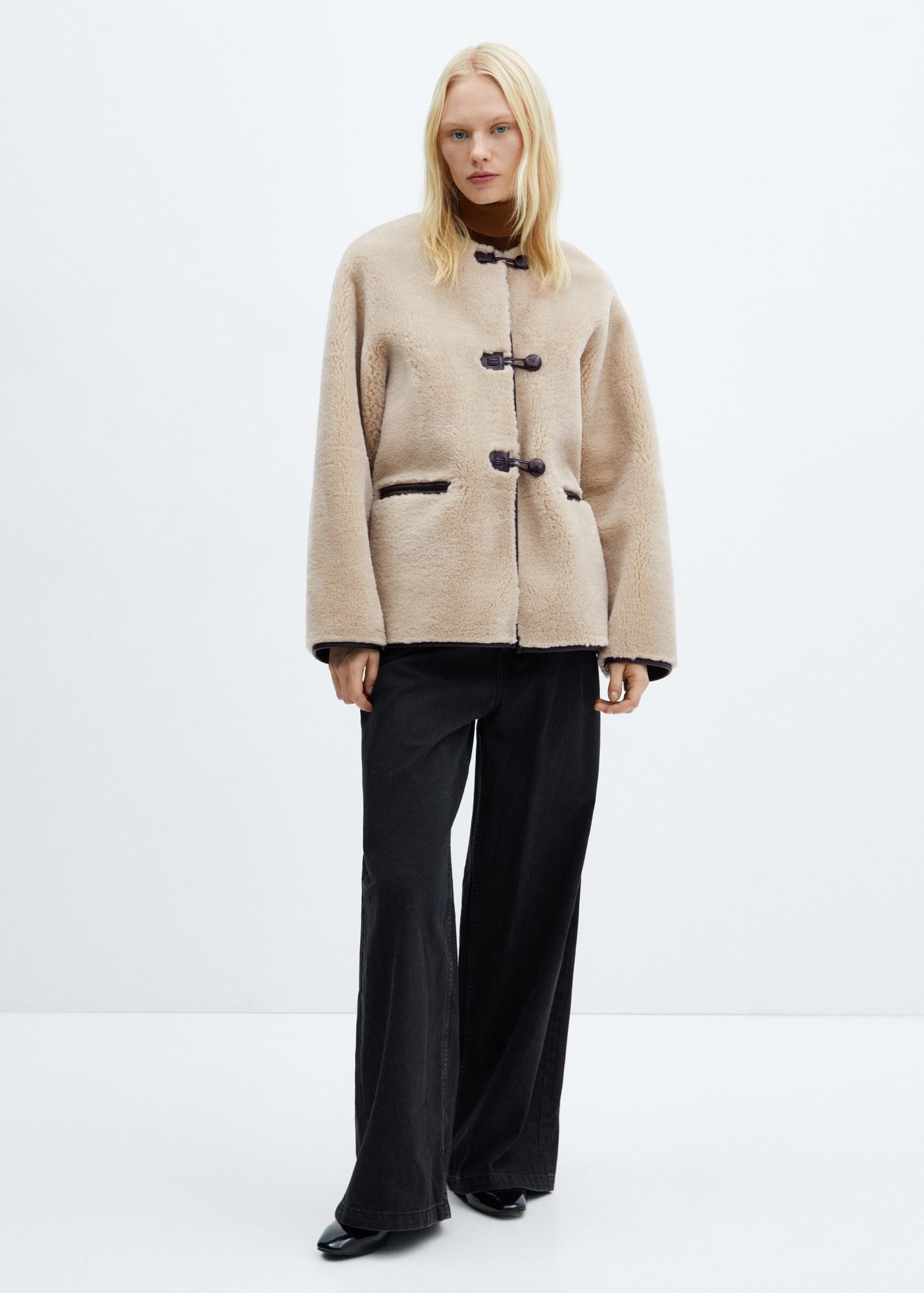 FLMNGO x Faux fur coat with applications