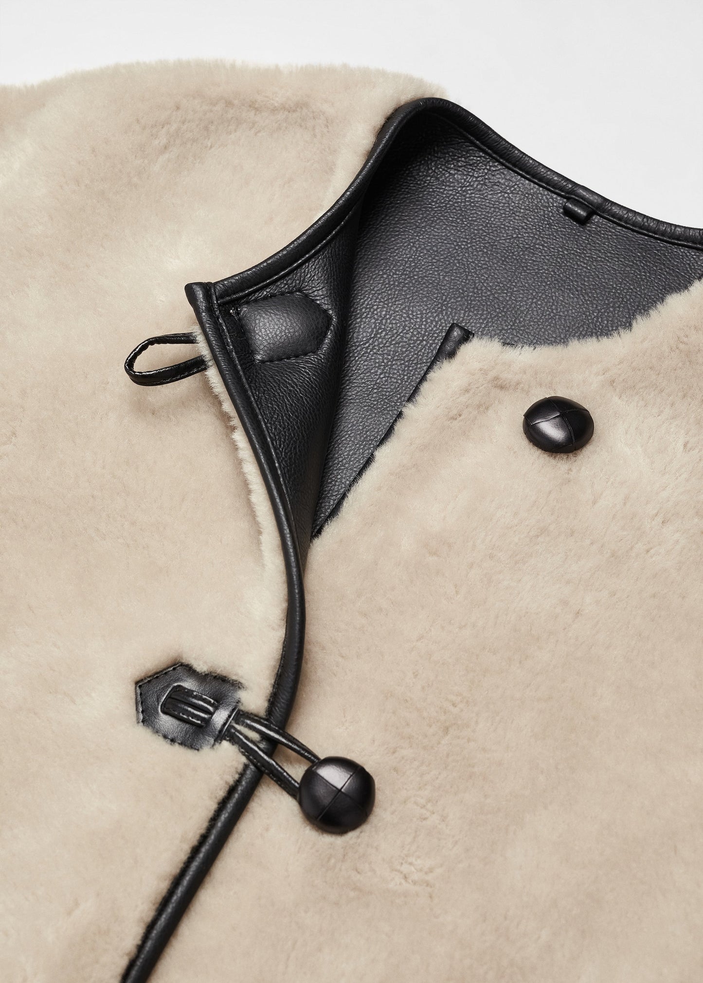 FLMNGO x Faux fur coat with applications